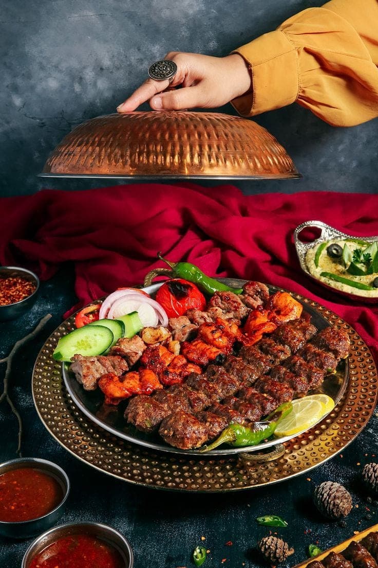 Mixed Arabic grill platter with kebabs and tikka